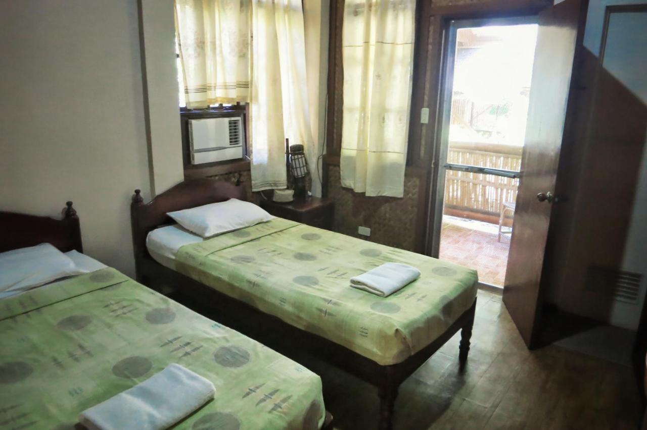 Pagdayon Traveler'S Inn Puerto Princesa Extérieur photo